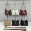 Ample Hobo Shoulder Bag with Signature Metallic Clasp